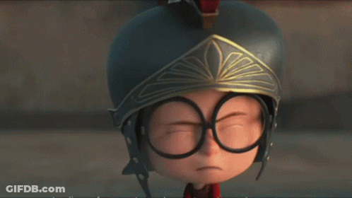 A Cartoon Character Wearing A Helmet And A Crown Looks Sad GIF