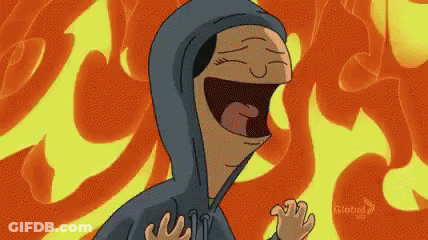 A Cartoon Character Wearing A Hoodie Is Laughing In Front Of Flames . GIF