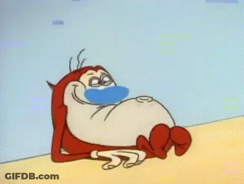 A Cartoon Character Wearing A Mask Is Laying On A Bed With A Blanket . GIF