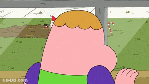 A Cartoon Character Wearing A Santa Hat And A Candy Cane GIF