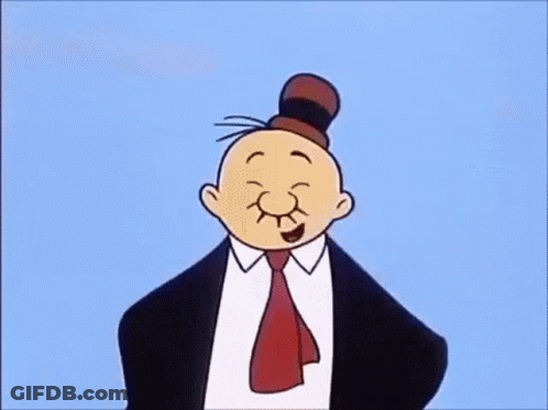 A Cartoon Character Wearing A Suit And Tie Is Making A Face . GIF