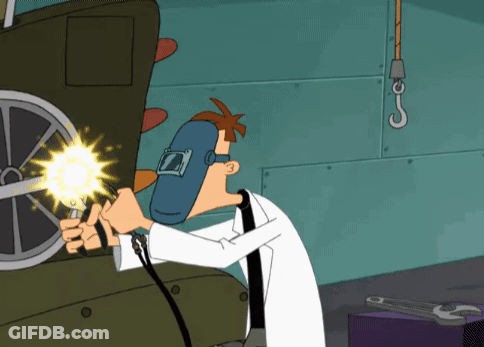 A Cartoon Character Wearing A Welding Mask Is Welding A Wheel GIF