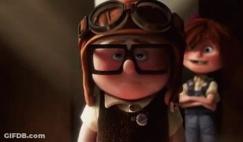 A Cartoon Character Wearing Glasses And A Helmet Is Standing Next To Another Cartoon Character . GIF
