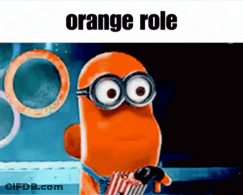 A Cartoon Character Wearing Glasses And Holding A Bag Of Popcorn With The Words `` Orange Role '' Written On It . GIF