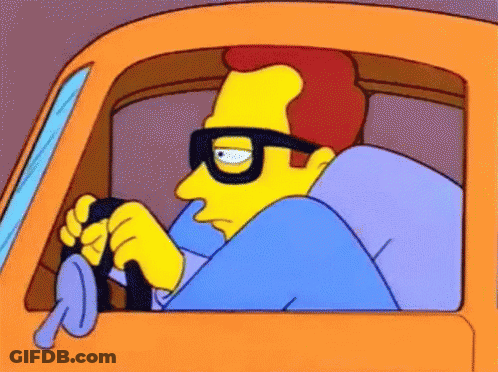 A Cartoon Character Wearing Glasses Is Driving An Orange Car GIF