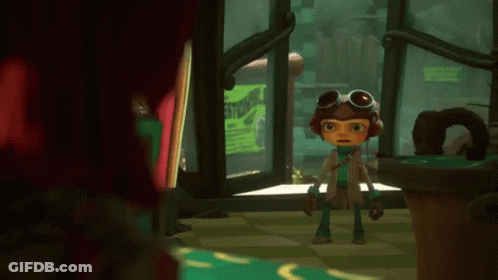 A Cartoon Character Wearing Goggles Is Standing In Front Of A Sign That Says Studio GIF