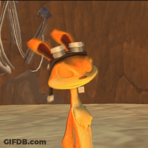 A Cartoon Character Wearing Goggles Stands On A Wooden Table GIF