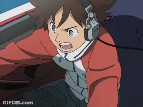 A Cartoon Character Wearing Headphones And A Red Jacket With The Letter T On His Chest GIF