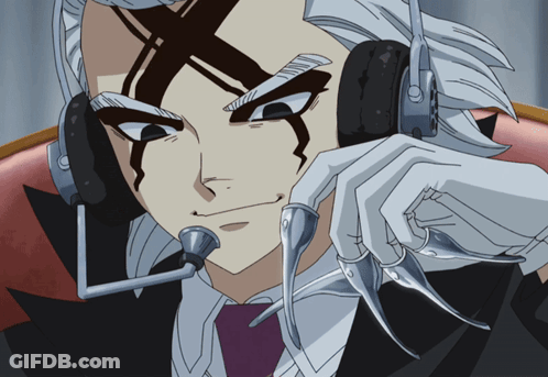 A Cartoon Character Wearing Headphones With A Microphone Attached To It GIF