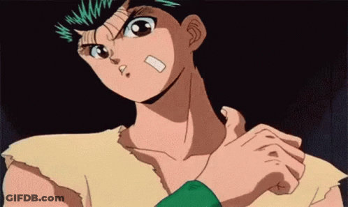 A Cartoon Character With A Bandage On His Face Is Standing In A Dark Room . GIF