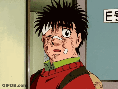 A Cartoon Character With A Bandage On His Face Stands In Front Of A Sign That Says E. GIF