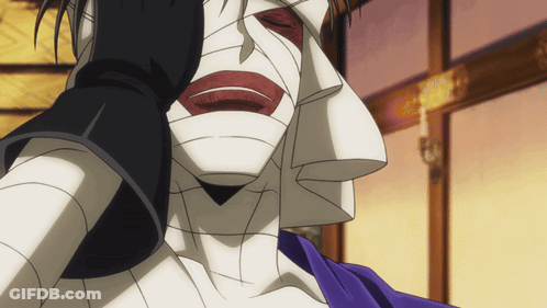 A Cartoon Character With A Bandaged Face And A Black Glove GIF