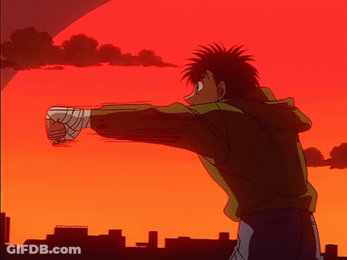 A Cartoon Character With A Bandaged Fist Is Standing In Front Of A Sunset GIF