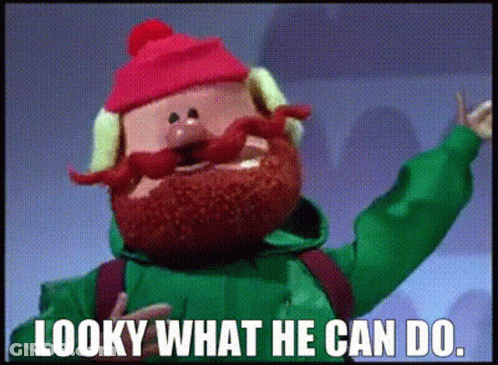 A Cartoon Character With A Beard And A Red Hat Says Looky What He Can Do GIF