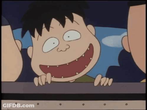 A Cartoon Character With A Big Mouth And Sharp Teeth Is Smiling GIF
