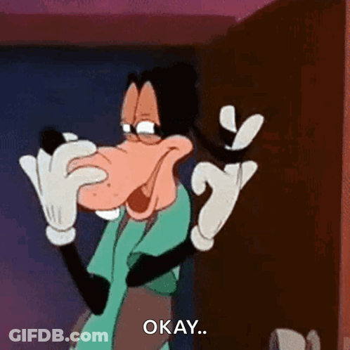 A Cartoon Character With A Big Nose Is Holding A Phone And Saying Okay . GIF