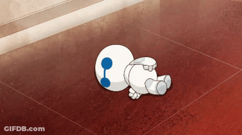 A Cartoon Character With A Blue Eye Is Laying On The Ground GIF