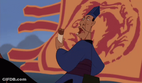 A Cartoon Character With A Blue Hat Stands In Front Of A Large Orange Flag GIF