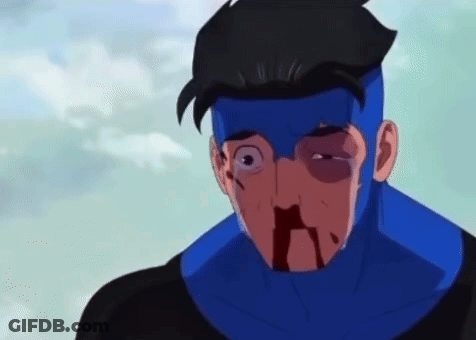 A Cartoon Character With A Blue Mask On His Face Is Bleeding From His Nose . GIF