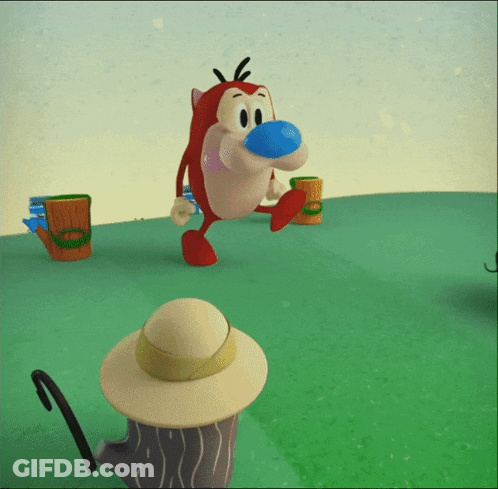 A Cartoon Character With A Blue Nose Is Walking On A Grassy Field GIF
