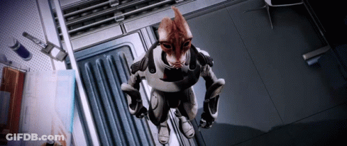 A Cartoon Character With A Cat 'S Head Is Standing In A Dark Room GIF