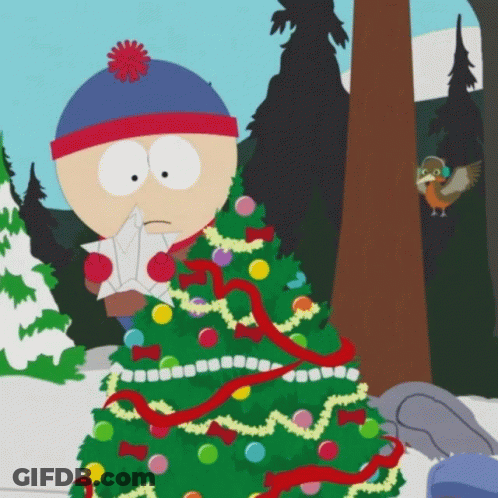 A Cartoon Character With A Christmas Tree In The Background GIF