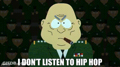 A Cartoon Character With A Cigar In His Mouth And The Words " I Don 'T Listen To Hip Hop " GIF