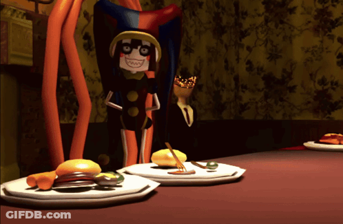 A Cartoon Character With A Crown On His Head Is Standing Next To A Table With Plates Of Food GIF