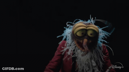 A Cartoon Character With A Disney Logo In The Background GIF