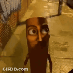 A Cartoon Character With A Face On It Is Standing On A Sidewalk In An Alleyway . GIF