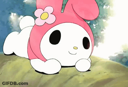 A Cartoon Character With A Flower On Her Head Is Laying Down GIF