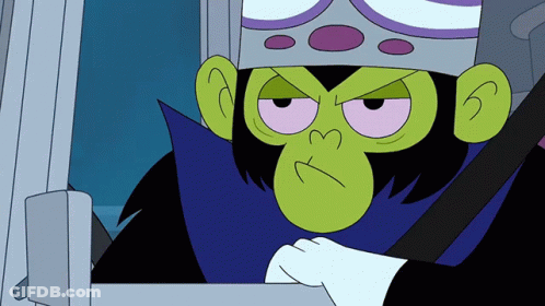 A Cartoon Character With A Green Face And A Purple Crown On His Head GIF