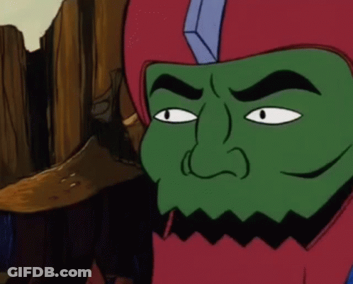 A Cartoon Character With A Green Face And A Red Helmet On GIF