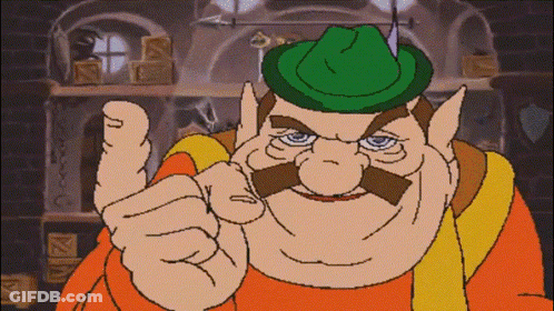 A Cartoon Character With A Green Hat And A Mustache Points At The Camera GIF