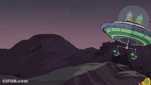 A Cartoon Character With A Green Light Coming From His Mouth GIF