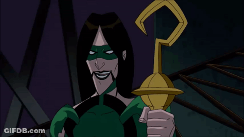 A Cartoon Character With A Green Mask Holds A Gold Object GIF