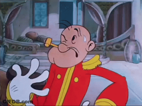 A Cartoon Character With A Hammer In His Mouth Is Making A Face GIF