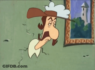 A Cartoon Character With A Hat And Mustache Is Hanging On A Wall Next To A Picture Frame . GIF
