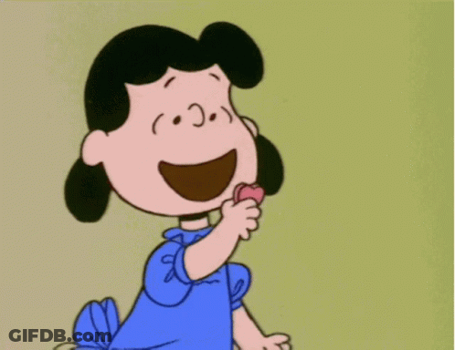 A Cartoon Character With A Heart In Her Hand GIF