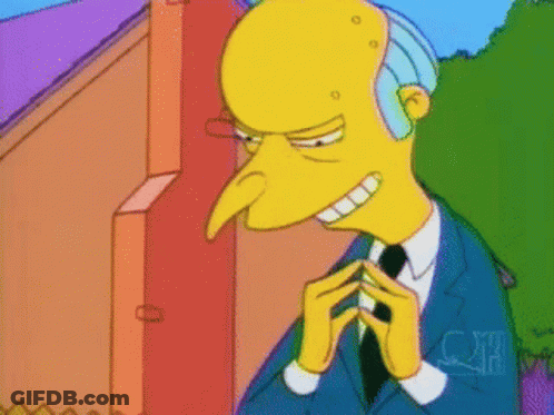 A Cartoon Character With A Long Nose Is Wearing A Blue Suit GIF