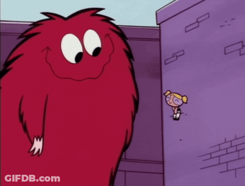 A Cartoon Character With A Long Tongue Sticking Out Of It 'S Mouth GIF