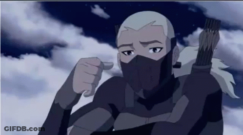 A Cartoon Character With A Mask On His Face Is Pointing At The Camera . GIF