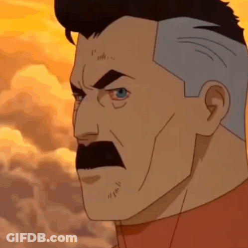 A Cartoon Character With A Mustache And Gray Hair Is Looking At The Camera . GIF