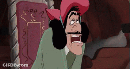 A Cartoon Character With A Pink Hat And Mustache Is Sitting In A Chair With His Mouth Open . GIF