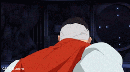 A Cartoon Character With A Red Cape And A White Head GIF