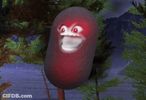 A Cartoon Character With A Red Face Is Hanging From A Tree GIF