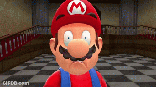 A Cartoon Character With A Red Hat And A White Letter M On It GIF