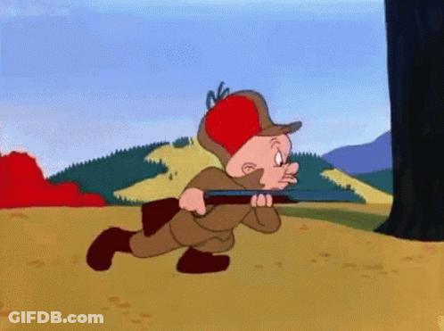A Cartoon Character With A Red Hat Is Running With A Gun GIF