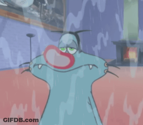 A Cartoon Character With A Red Nose Is Standing In A Room GIF