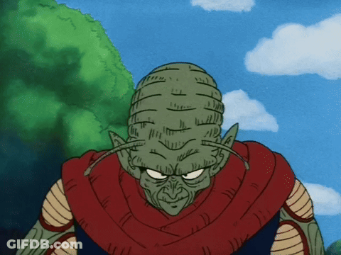 A Cartoon Character With A Red Scarf Around His Neck Is Looking At The Camera GIF